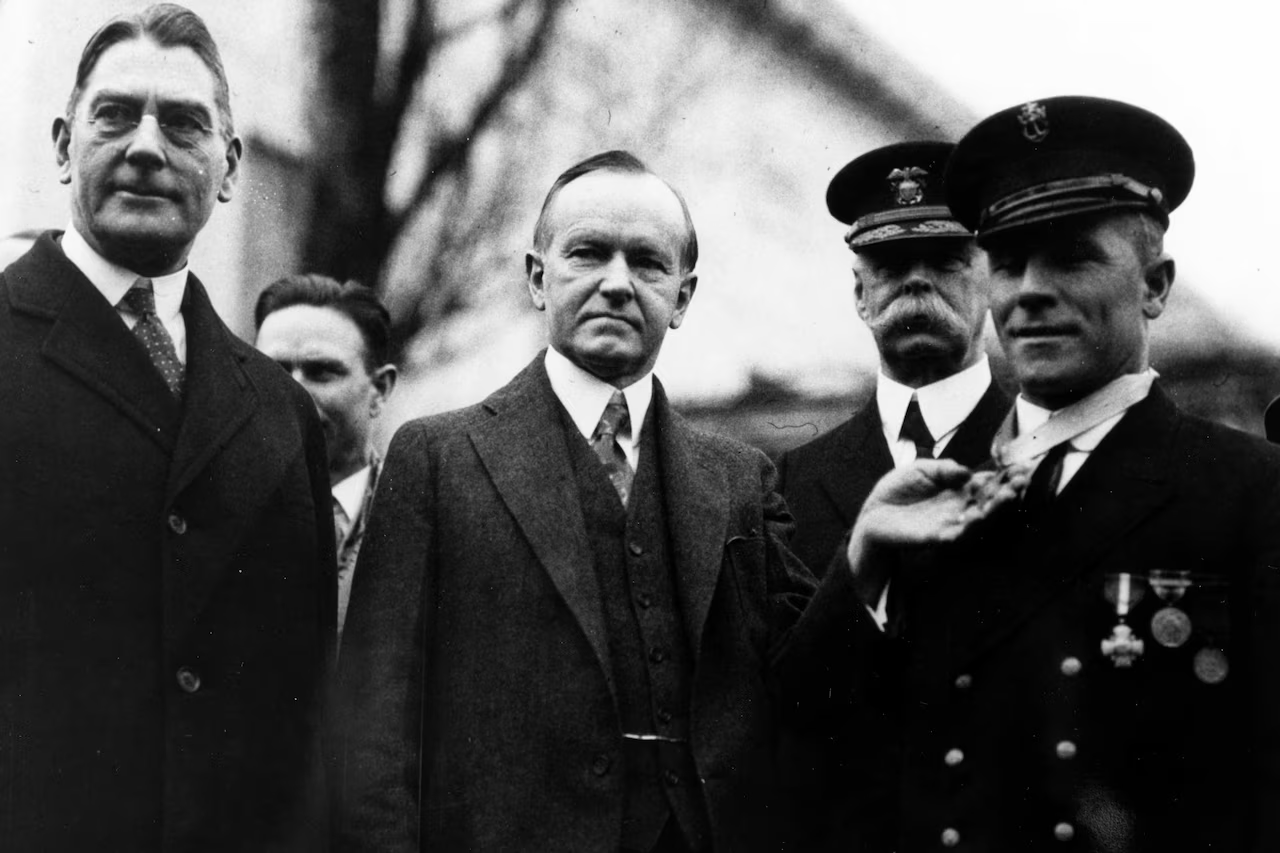 Thomas Eadie poses with President Calvin Coolige after receiving his Medal of Honor